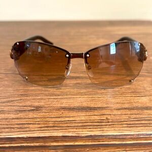 GUCCI sunglasses! Wrap around with Gucci logo on the sides! Rose gold colour